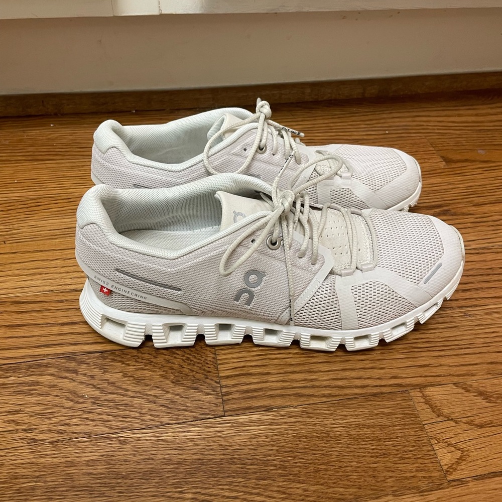 On clouds. Off white. Size 8 women’s.